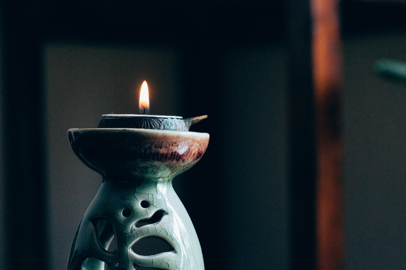 Soft candlelight in a calm spa room